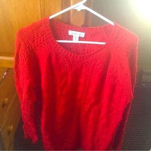 Bright red pullover sweater